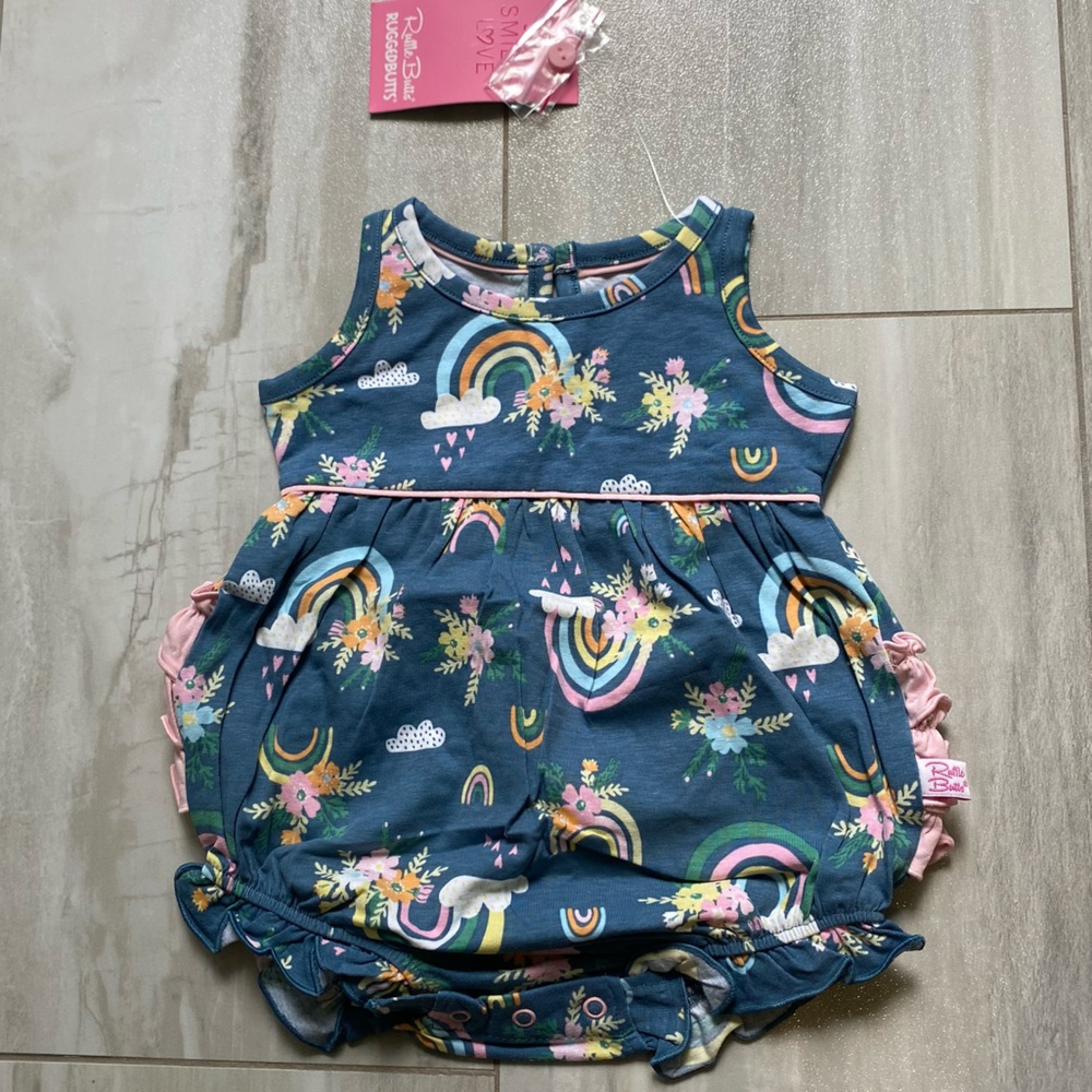 NWT RuffleButts Dark Blue & Pink Floral Rainbows Ruffles Bubble Romper, 0-3M